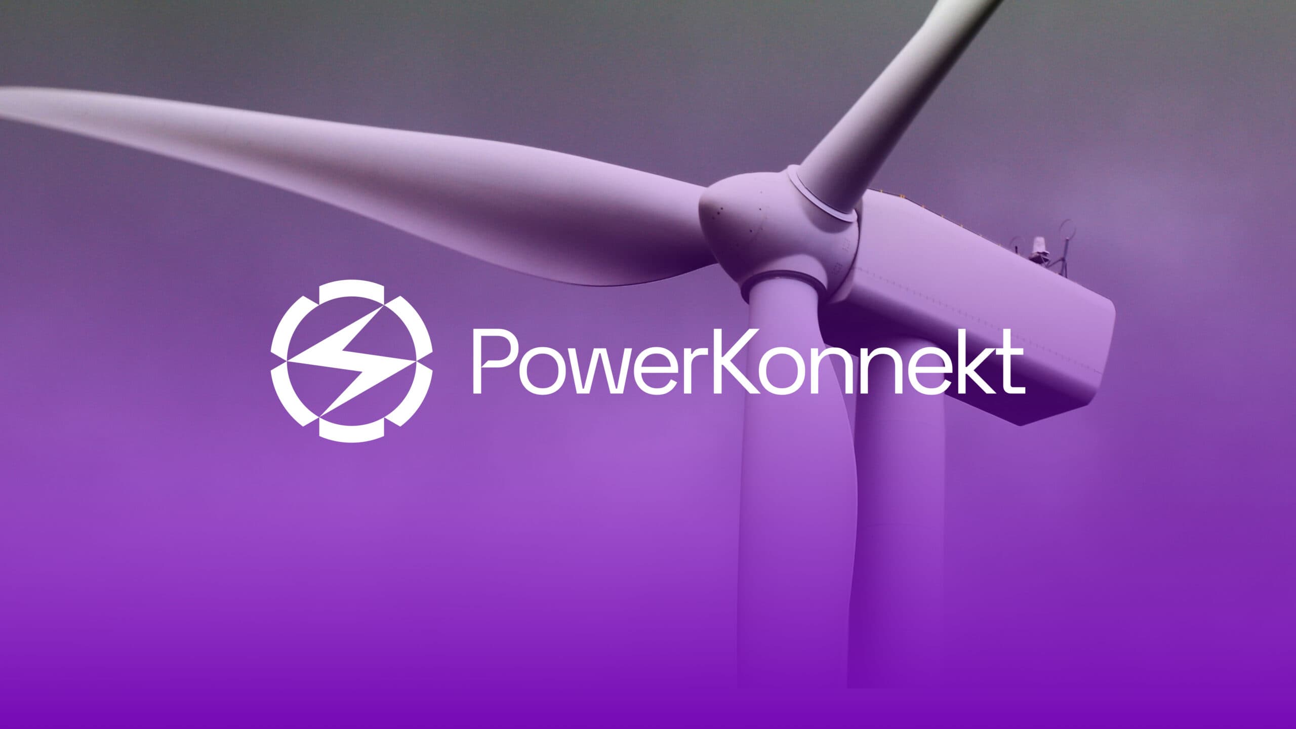 A photograph of the base and one rotor blade of a large wind turbine, tinted with a strong purple and pink color gradient, possibly suggesting a sunset or stylized look. The white "PowerKonnekt" logo, a lightning bolt inside a circular frame, is positioned on the left next to the company name "PowerKonnekt" in white text.
